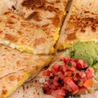 Breakfast Quesadilla · Flour tortilla, mozzarella cheese & scrambled eggs, with your choice of salsa on the side an...