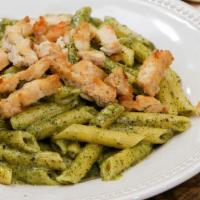 Chicken Pesto Pasta · Marinated chicken, basil garlic and olive oil with pine nuts.