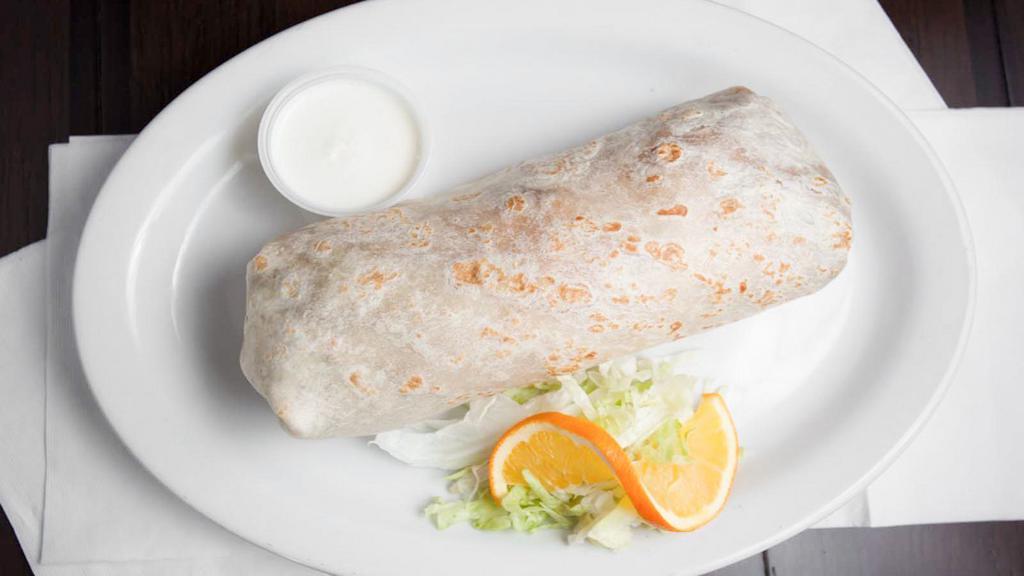 Regular Burrito · Filled with choice of meat, rice, beans, and mild salsa. Wrapped in a flour tortilla.