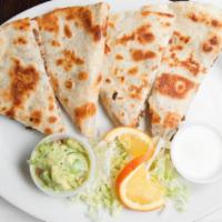 Meat Quesadilla · Grilled flour tortilla, filled with a choice of meat and a cheesy filling. Served with sour ...