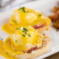 Traditional Benedict · choice of english muffin or focaccia, canadian bacon, two poached eggs, hollandaise sauce, c...