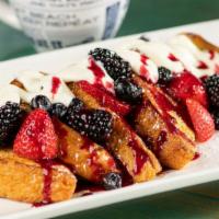 Berry Sweet French Toast · House-made mixed berry jam, fresh berries and sweet cream cheese.