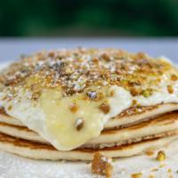 Lemon Ricotta Pancake · buttermilk pancakes, meyer lemon curd, whipped honey ricotta, pistachio brittle