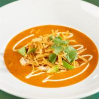 Chicken Tortilla Soup · queso fresco, cilantro, tortilla strips, avocado, sour cream sauce