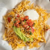 Carne Asada Fries · With beans, salsa fresca, guacamole, sour cream, and cheese.