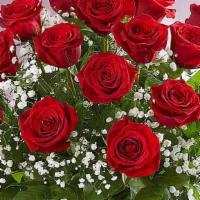 Rose Elegance™ Premium 12 Long Stem Red Roses · Surprise the one you love with this beautiful arrangement.Beautifully arranged by our expert...