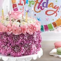 Birthday Wishes Flower Cake ™ Pastel · Shaped to match a birthday cake but filled with flowers instead. Pink mini carnations, laven...