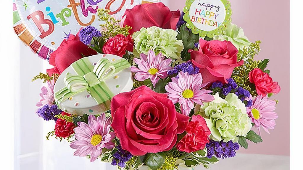 Happy Birthday Present Bouquet W/Balloon · Surprise the birthday person with this arrangement that is bursting with bright colorful flowers.One-sided arrangement with hot pink roses, hot pink and lime green carnations, lavender daisy pom, purple statice, solidago, and assorted greenery will brighten up their day.