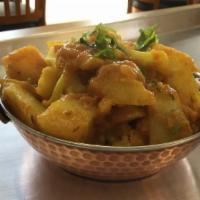 Aloo Gobhi · Vegetarian. Fresh cauliflower, potato, and onion cooked with Indian spices.
