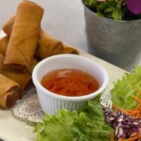 Egg Rolls · 6 rolls. Stuffed with carrot, mushroom and cabbage served with plum sauce.