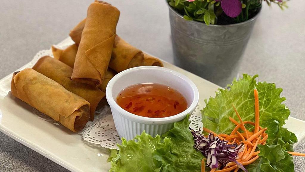 Egg Rolls · 6 rolls. Stuffed with carrot, mushroom and cabbage served with plum sauce.