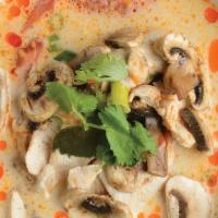 Tom-Kha Hot Pot · Thai coconut milk with Thai herb, tomato, onions, cilantro and mushroom.