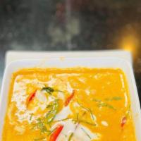 Panang Curry · Mild sweet curry with bell peppers and coconut milk with kaffir lime leaves.
