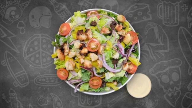 House Salad · Romaine Lettuce,  Cherry Tomatoes, Onion, Black Olives, Croutons, Pepperoncini, Italian Dressing on the side.  Add Chicken Breast or Prosciutto for $5.