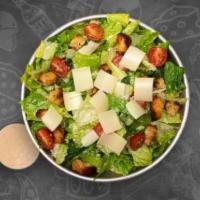 Caesar Salad · Classic Caesar Salad Paired with Cherry Tomatoes, and Rustic Garlic Parmesan Croutons.  Caes...