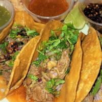 Birria Tacos Platter · 3 Birria Tacos with Rice and Beans.
Garnished with Cilantro & Onions. Green Salsa & Birria C...