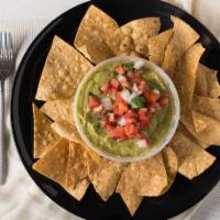 Guacamole Dip · Fresh avocado blended with the chef’s special ingredients accompanied with a side of pico de...