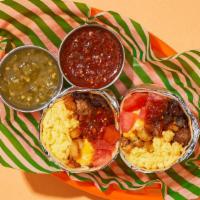 Alarm Clock Spicy Breakfast Burrito · Two scrambled eggs with hot sausage, crispy tater tots, melted cheese, spicy salsa, carameli...