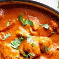 Chicken Tikka Masala · Diced tandoori chicken cooked with tomatoes and herb sauce.