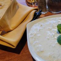 Must O' Khiar · Special homemade yogurt mixed with chopped cucumber and mint.