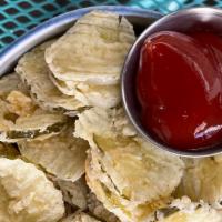 Fried Pickles · CRISPY FRIED PICKLES SERVED WITH A SIDE OF HOUSE KETCHUP