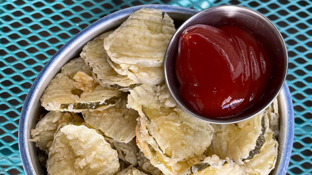 Fried Pickles · CRISPY FRIED PICKLES SERVED WITH A SIDE OF HOUSE KETCHUP