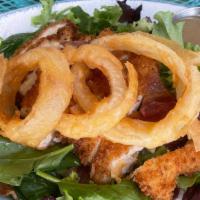 Maple Bacon Fried Chicken Salad · LETTUCE, FRIED CHICKEN BREAST, CANDIED BACON, SHOE STRING ONION RINGS, AND  DRESSED WITH MAP...