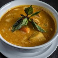 Cambodian Chicken Curry (Ka-Ri Sach Monn) · 32 oz of boneless chicken, potato, carrot, onion & green bean (seasonal)  in a creamy blend ...