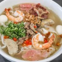 Jay Chan Bowl · The bowl comprise of flat noodle, oxtail, shrimp, quail egg, meatball, sliced beef, tripe, g...