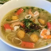 Kathiew Seafood · Rice noodle with shrimp, fish ball, mussel, squid, and imitation crab meat, in a savory oxta...