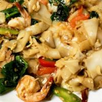 Drunken Noodle (Pad Kee Mao - Thai) · Thick rice noodle sauteed with protein of choice, Chinese broccoli, onion, basil in a sweet ...