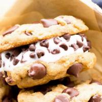 Ice Cream Sandwich · Two fresh chocolate chip cookies with a scoop of your favorite flavor ice cream.