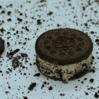 Oreo Cookie Ice Cream Sandwich  · 2 Large oreo cookies with a scoop of your favorite ice cream flavor!