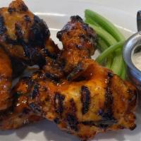 Baked Chicken Wings 12 Piece · Baked then grilled with Point Raised blue cheese.