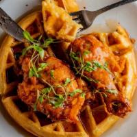 Chicken And Liege Belgian Waffles · Two mouthwatering slices of breaded chicken breast and two authentic Liege Belgian waffles. ...