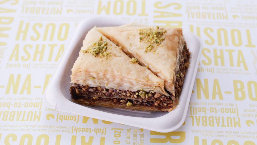 Baklava · Layers of filo pastry and nuts soaked in rosewater syrup.