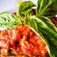 Lasagna Pura · Cashew ricotta, baby spinach, crimini mushroom, house-made cashew mozzarella, marinara.