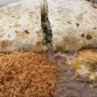 Cheese Quesadilla · A large king sized, Flour Tortilla loaded with melted Cheese served with Guacamole and sour ...