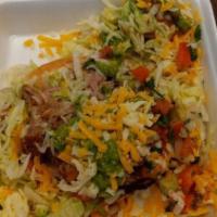 Tostadas · A crispy corn tortilla layered with refried beans with your choice of chicken, carne asada (...