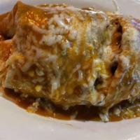 Zapata Burrito · A jumbo flour tortilla loaded with your choice of charbroiled chicken, carne asada (steak) o...