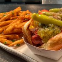 Western Chicago · Relish, onion, pickle, tomato, cucumber, sport pepper, celery salt and mustard on a poppysee...