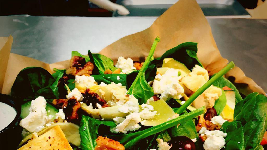 Norcal Feta Greens · Fresh spinach, feta cheese, candied walnuts, cucumbers, artichoke hearts, sliced red grapes and tomatoes, Served with raspberry vinaigrette.