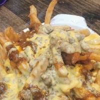 Cheesy Fries · Our delicious fries topped with our homemade cheese sauce