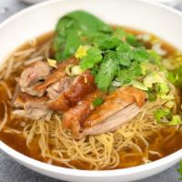 Roasted Duck Noodle · Roasted duck, bean sprouts baby bok choy, scallions in brown herb soup.