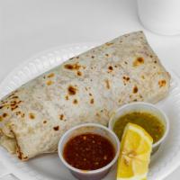 Burrito · Meat of your choice topped with beans, rice, onions, cilantro, and cabbage.