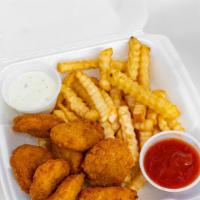 Chicken Nuggets · Seven piece fried chicken nuggets served with sauce of your choice.
