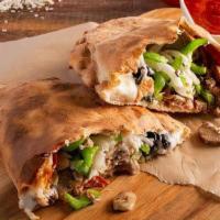 Deluxe Calzone · Pepperoni, italian sausage, mushrooms, onions, green peppers, black olives, mozzarella & ric...