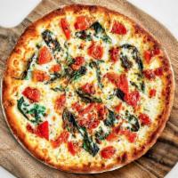 Margherita Pizza (Gluten Free Crust) · Garlic, tomatoes, basil and extra cheese.