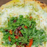 Arugula Salad Foldover · Basil pesto, Drake Family Farms goat cheese and mozzarella flatbread, topped with a salad of...