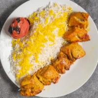 Joojeh Kabob · Marinated boneless chicken thighs and legs served with basmati rice and grilled tomato.